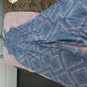 Women  palazzo pants with  blue with patterns on it size smalls